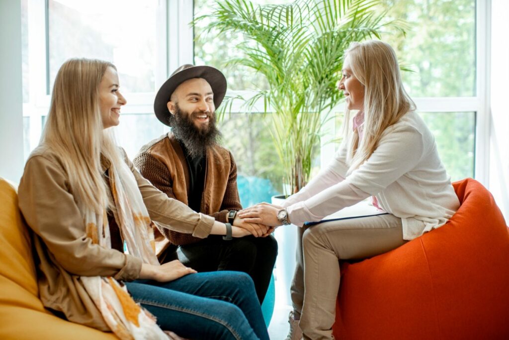 young-couple-during-the-psychological-counseling-with-psychologist-e1656474340387.jpg